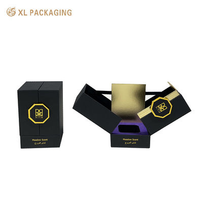 Luxe geschenkdoos voor parfum met dubbele magnetische sluiting, afgewerkt in zwart en goud, met EVA-schuim inleg