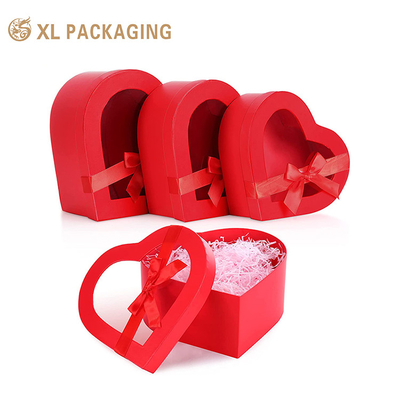 kopen Groothandel Luxe hartvormige bloemencadeau doos Custom logo bedekt papier die-cut voor verpakking en stickers online manufacture