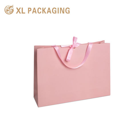 kopen Luxe roze cadeauzakje met eigen logo, premium mat karton en goudfoliestempel voor boetiekverpakkingen online vervaardiging