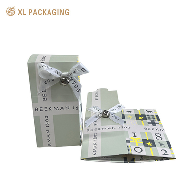 XL verpakking gedrukte cosmetische opvouwbare kaartdoos kartonnen papier opvouwbare kaartdoos map lip verpakkingsdoos met lint boog