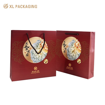 Groothandel Geprinte gedrukte papieren zakken Custom Logo Luxe Shopping Gift Paper Bag Met Handvat