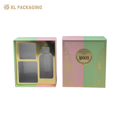 Elegante gespleten roze groene stijve huidverzorging geschenkdoos Dubbel goud en zwart hot stamping, aangepaste PET-inzet gevoerde gouden kaart Luxe cosmetische verpakking
