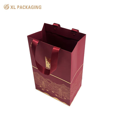 Premium milieuvriendelijke luxe geschenktas met gouden foliedruk en versterkte linthandvatten voor aangepaste verpakking
