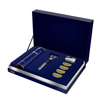 Donkerblauwe verpakkingsdoos met vergrendeld deksel met een lint voor thee